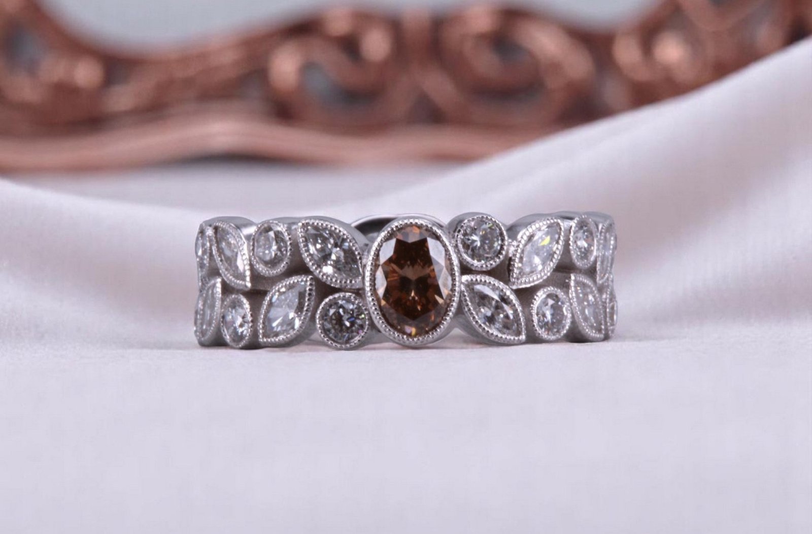 Non-traditional rootbeer diamond floral ring for couples in Del Mar